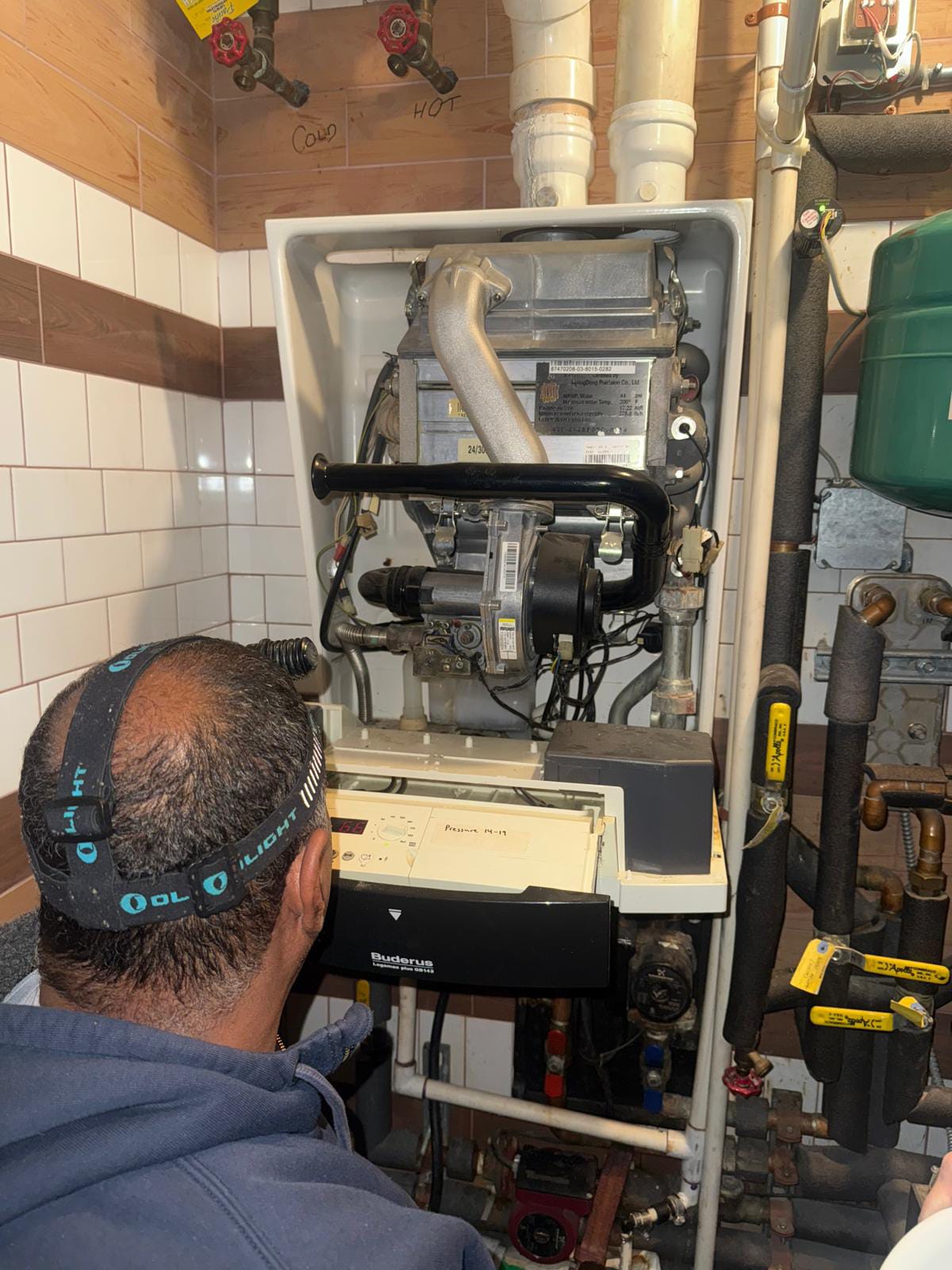 Our licensed technican is diagnosing the boiler in Astoria, NY